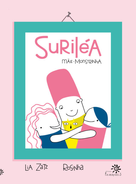 Capa do livro Suriléa, mãe-monstrinha, com fundo rosa-claro e moldura verde-água simulando um quadro pendurado. No centro, uma ilustração simples e colorida mostra três personagens abraçados com expressão feliz: uma figura central com corpo branco e cabelo alto rosa (Suriléa), abraçada por duas crianças, uma de cabelo rosa ondulado e outra de cabelo azul liso. Um pequeno gato amarelo aparece no meio do abraço. O título está em letras grandes rosa na parte superior e o subtítulo “Mãe-monstrinha” em letras pretas desenhadas à mão. Abaixo, os nomes das autoras: Lia Zatz e Rosinha. No canto inferior direito, o logotipo da Editora Peirópolis.